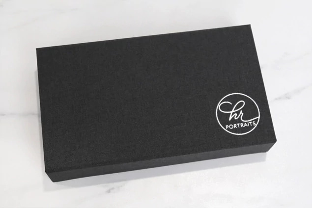 Dark gray Tyndell Carbon Fabric Flash Drive USB and Print Box 5x7 with satin ribbon closure.