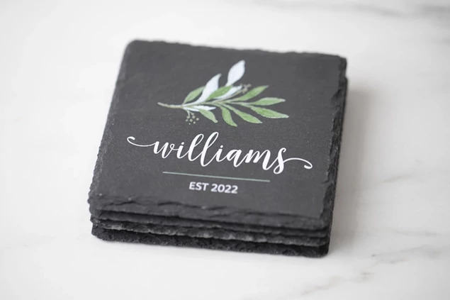 Set of four gray Tyndell Slate Coasters with cork bottom with full color printing.