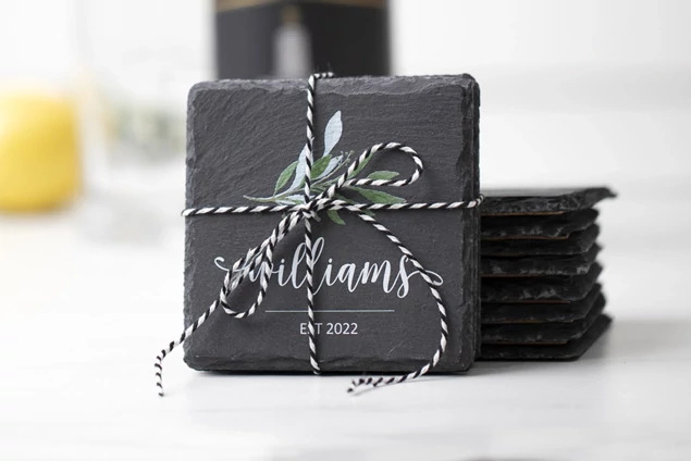 Set of four gray Tyndell Slate Coasters with cork bottom with full color printing.