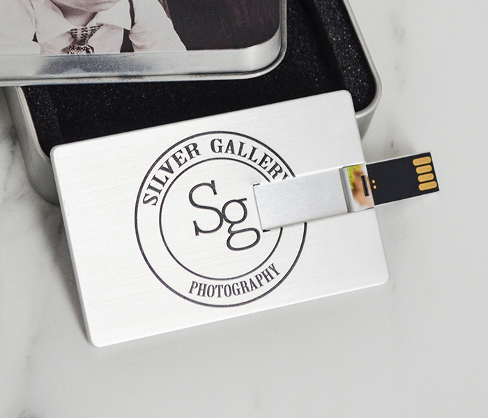 silver metallic credit card flash drive
